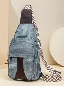Fashionable crossbody chest bag in vintage grey with brown leather and woven strap