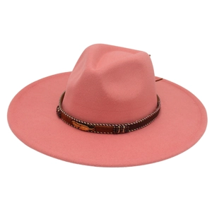 Close-up of pink wool fedora hat featuring woven band with gold feather and beads