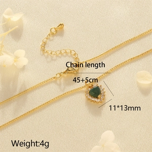 Detail of 18K gold heart necklace with green stone and chain length dimensions