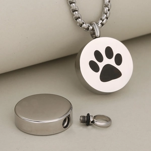 Silver stainless steel pet urn necklace with paw print and openable memorial pendant