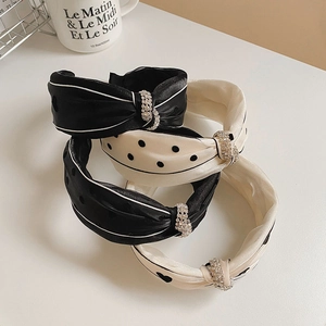Polka dot and heart patterned knot headbands with rhinestones in black and white