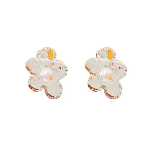 Irregular silver petal earrings with center pearl accent and hammered metal texture