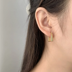Elegant gold S925 sterling silver square hoop earrings worn by a model on a grey background