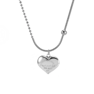 Silver heart necklace with mixed bead and snake chain design on a white background