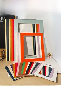 Macro view of multi-colored textured mat boards for creative DIY photo framing and art