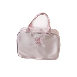 Borsa da trucco rosa a tre strati con ricamo a fiocco e manico per il viaggio