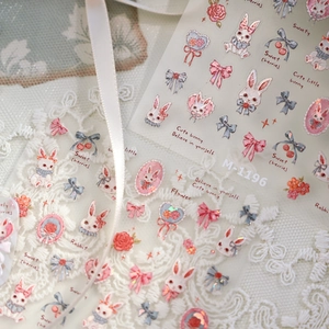 Cute M-1196 nail stickers with relief bunnies and bows on a white lace background