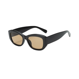 Vintage oversized square sunglasses for women with black frames and tinted brown lenses