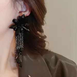 Dark style floral earrings with long tassels and black crystals for a gothic aesthetic