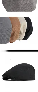 Close-up of vintage corduroy flat cap featuring an adjustable metal buckle strap