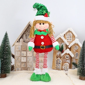 Close-up of a Christmas elf plush with red and green sequins and striped telescopic legs