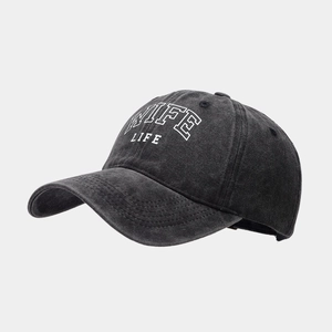 Detail of washed charcoal cotton baseball cap featuring white WIFE LIFE embroidery