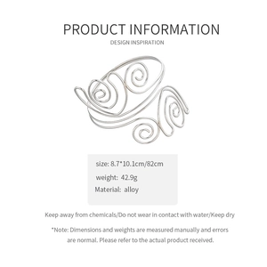 Detail view of silver alloy twisted spiral upper arm cuff with 8.7x10.1cm dimensions