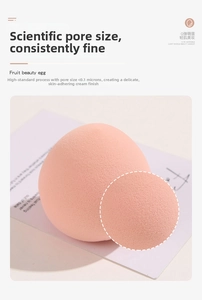 Macro shot showing the fine microscopic pores on a soft pink beauty sponge surface