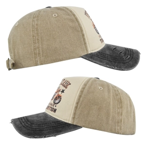 Detail of vintage khaki motorcycle cap showing distressed brim and retro print