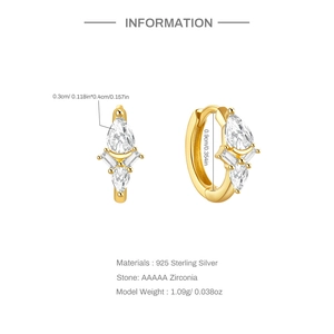 Detail view of 925 silver gold hoop earrings with clear marquise cut zircon stones
