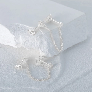 Macro shot of S925 sterling silver stamp on crystal tassel chain drop earrings