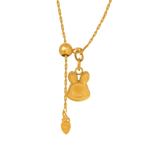 Adjustable gold bunny necklace with carrot charm and matte finish bunny pendant