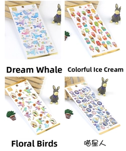 Detail showing four decorative sticker themes including whales, cats, birds and ice cream