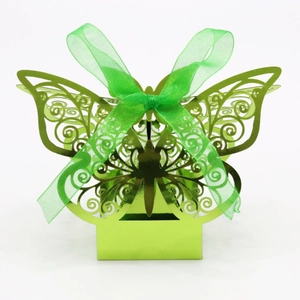 Laser cut butterfly candy box made of grass green metallic cardstock and organza ribbon