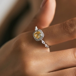 S925 silver ring featuring a yellow cushion-cut crystal with halo stones and side marquise gems