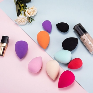 Macro shot of colorful non-latex makeup sponges in various sizes and vibrant shades