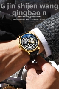 GENTLEMAN style detail showing hollow mechanical watch movement and golden steel case