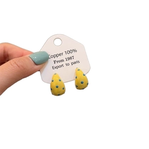 Vintage gold-plated drop earrings with yellow and blue leopard pattern in copper