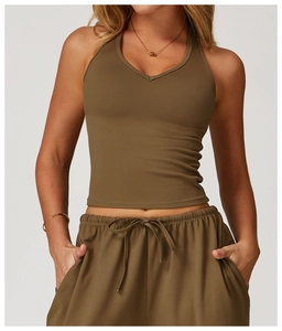 Detail of V-neck halter yoga top and drawstring shorts in olive green brushed fabric