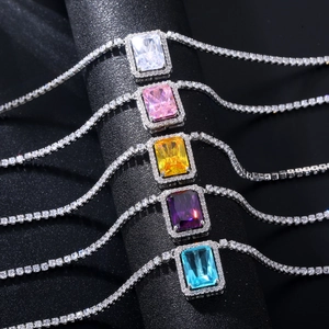Rectangle zircon pendants in five colors on dark stands with glittering crystal chains