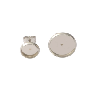 Silver stainless steel stud earring blanks with backings on white background for DIY