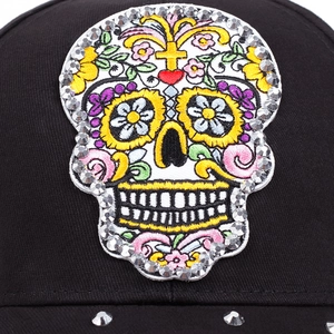 Fashionable black baseball cap with colorful sugar skull embroidery and shiny rhinestones