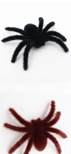 Macro view of realistic flocked spiders in black and dark red for Halloween decor