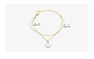 Détail du bracelet double couche plaqué or 18K avec zircon, longueur 17cm et pendentif