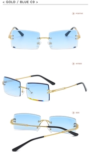 Detail view of gold rimless rectangular sunglasses with light blue gradient lenses