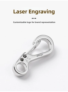 Detailed macro view of silver mini spring snap hook with laser engraved SF logo and key ring