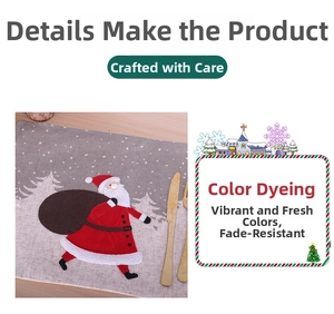 Detailed view of Santa Claus Christmas placemat with gray fabric and white snow pattern