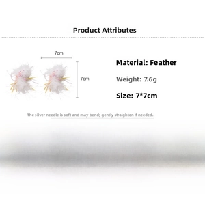 Detailed view of white feather pendant earrings with 7x7cm size markings and silver pins