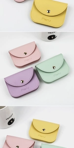 Macro view of pastel candy-colored PU leather coin purses with metallic snap closures