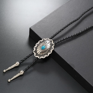 Retro turquoise floral bolo tie with silver metal buckle and black braided leather cord