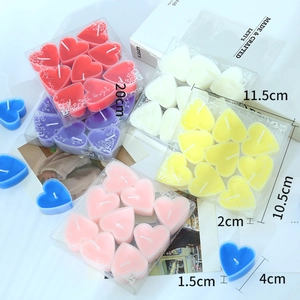 Set di 9 candele profumate a forma di cuore in vari colori con confezione in PVC
