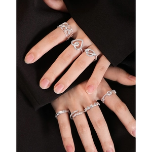 Minimalist S925 sterling silver hollow heart rings with a shiny silver finish for women