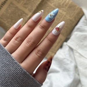 3D cherry almond press-on nails with floral resin charms and tortoiseshell patterns