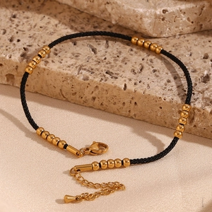 18K gold plated stainless steel beads on black rope anklet with adjustable lobster clasp