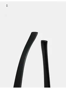Detail showing curved glossy black temple legs of sporty cycling sunglasses