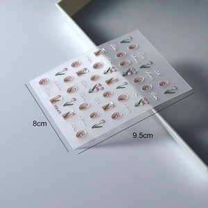 Close-up of pink tulip and floral relief nail stickers with 8x9.5cm dimensions