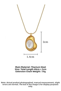 Detailed view of titanium steel necklace with cat-eye stone pendant and gold finish