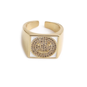 Macro shot of gold square face ring with white enamel background and zircon smiley face