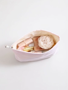 Trousse à maquillage rose avec broderie nœud et fermeture éclair pour le voyage
