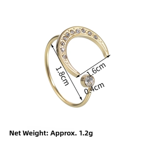 Detail of adjustable crescent moon ring in gold with sparkling inlaid crystals and size specs